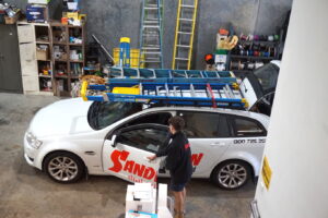 School Sound system technicians on way to repair and service speakers